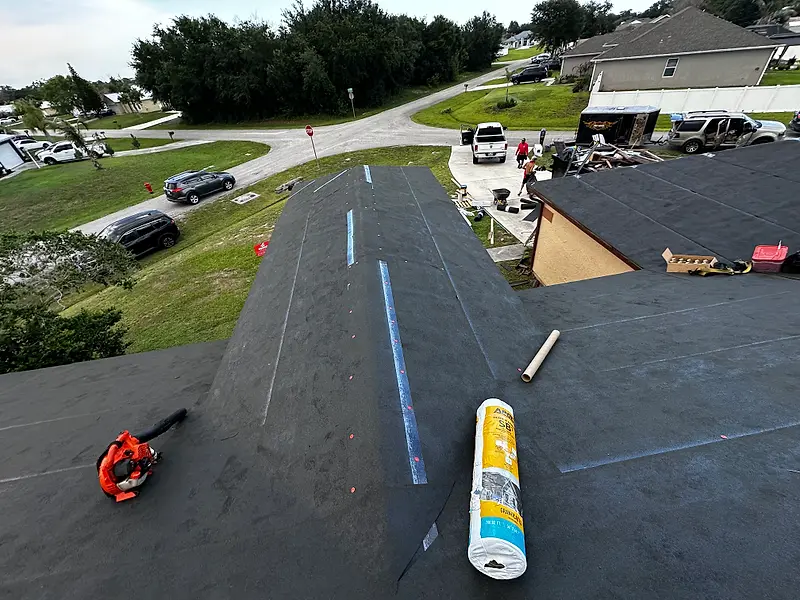 New underlayment on a roof with tools ready